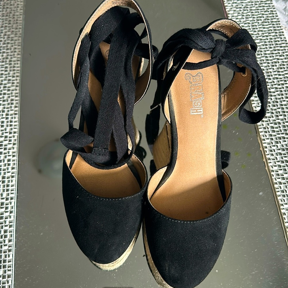 Black wedge shoes like new.
